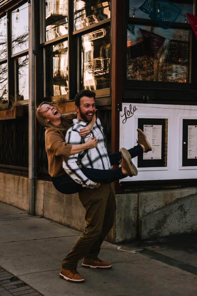 girl piggy back riding on a guy