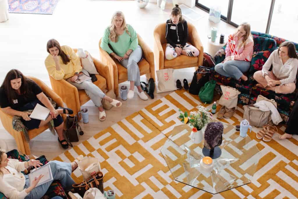 women in a circle for group coaching