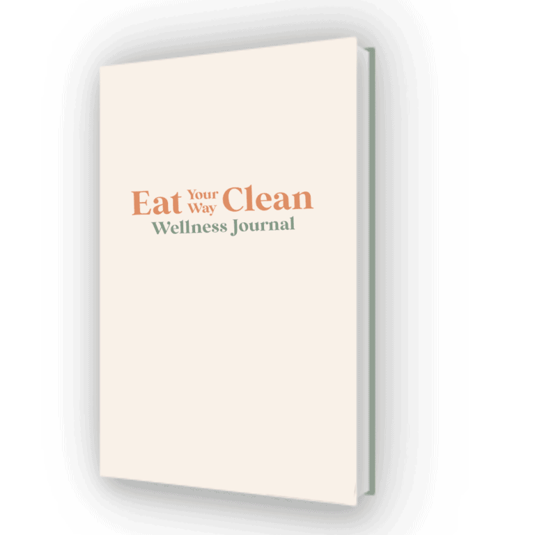Image of a book at an angle - Light peach cover with words: Eat your way clean wellness journal